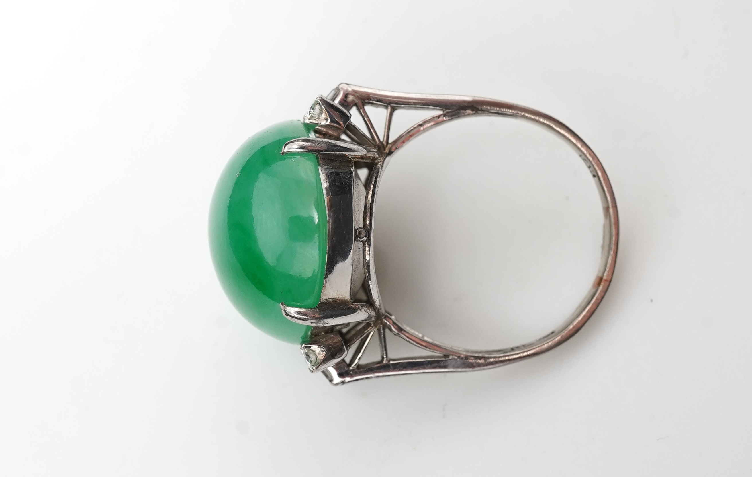 A jadeite and diamond ring